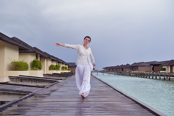 Image showing young woman relax on cloudy summer day