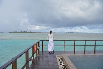 Image showing young woman relax on cloudy summer day