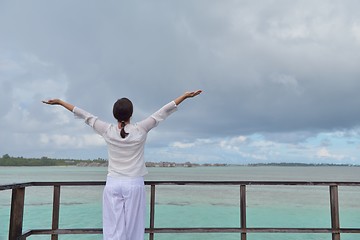 Image showing young woman relax on cloudy summer day