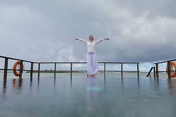 Image showing young woman relax on cloudy summer day