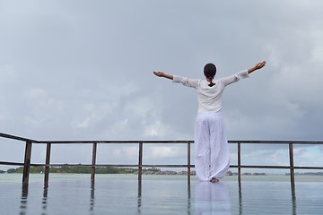 Image showing young woman relax on cloudy summer day