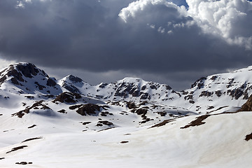 Image showing Snowy mountains in clouds