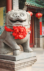 Image showing Statue decorated for Chinese New Year