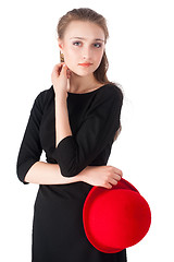 Image showing young beautiful woman with red hat