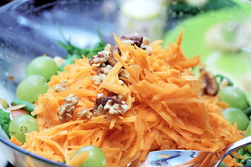 Image showing carrot salad with nuts and grapes