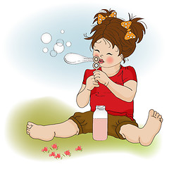 Image showing funny lovely little girl blowing soap bubbles