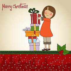 Image showing pretty young girl with a lot of Christmas gift box