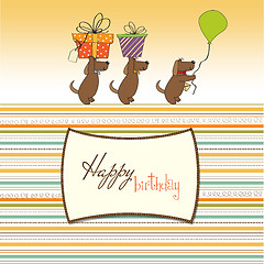 Image showing three dogs that offer a big gift. birthday greeting card