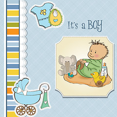 Image showing little baby boy play with his toys