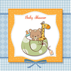 Image showing new baby announcement card with bag and same toys