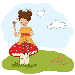 Image showing pretty young girl sitting on a mushroom