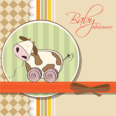 Image showing Baby shower card with cute cow toy