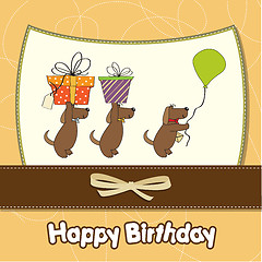 Image showing three dogs that offer a big gift. birthday greeting card