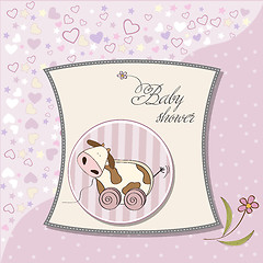 Image showing Baby shower card with cute cow toy