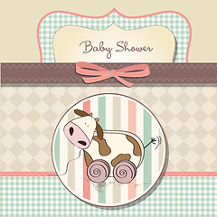 Image showing Baby shower card with cute cow toy