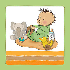 Image showing little baby boy play with his toys