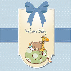 Image showing new baby announcement card with bag and same toys