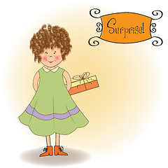 Image showing curly young girl she hide a gift