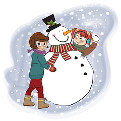 Image showing two happy girls building a snowman
