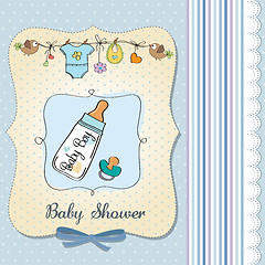 Image showing baby announcement card with milk bottle and pacifier