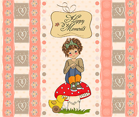 Image showing pretty young girl sitting on a mushroom