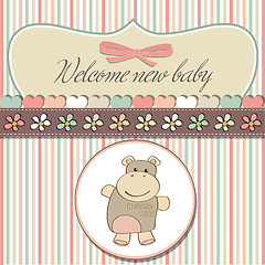 Image showing childish baby girl announcement card with hippo toy