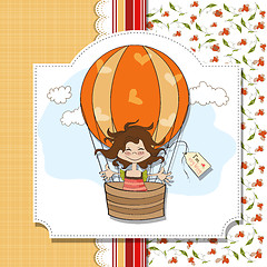 Image showing happy girl flying with a balloon flying