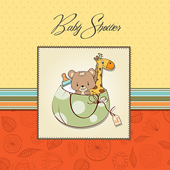 Image showing new baby announcement card with bag and same toys