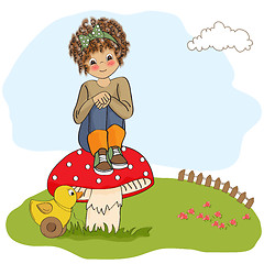 Image showing pretty young girl sitting on a mushroom