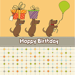 Image showing three dogs that offer a big gift. birthday greeting card