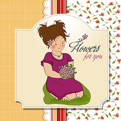 Image showing young girl with a bouquet of flowers