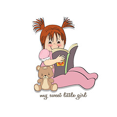 Image showing sweet little girl reading a book