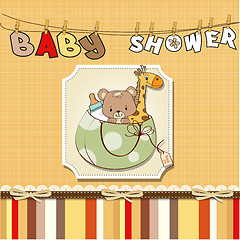 Image showing new baby announcement card with bag and same toys