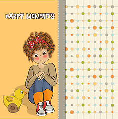 Image showing curly girl play with her duck toy