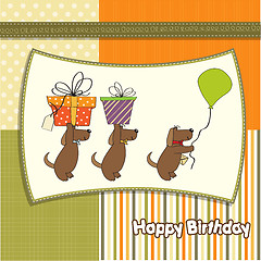 Image showing three dogs that offer a big gift. birthday greeting card