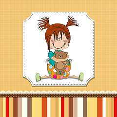 Image showing little girl sitting with her teddy bear