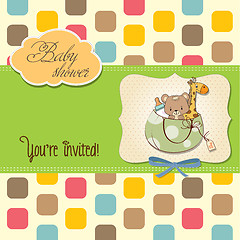 Image showing new baby announcement card with bag and same toys