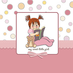 Image showing sweet little girl reading a book