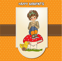 Image showing pretty young girl sitting on a mushroom