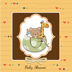 Image showing new baby announcement card with bag and same toys