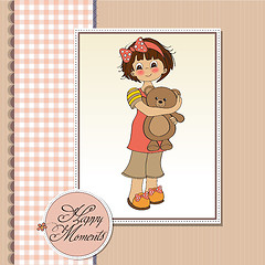 Image showing young girl going to sleep with her favorite toy, a teddy bear