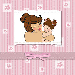 Image showing young mother holding a new baby girl