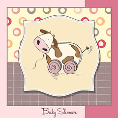 Image showing Baby shower card with cute cow toy