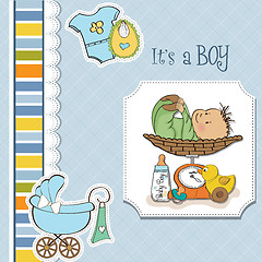 Image showing baby boy weighed on the scale