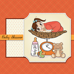 Image showing Beautiful baby girl on on weighing scale