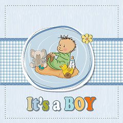 Image showing little baby boy play with his toys.baby shower card in vector fo