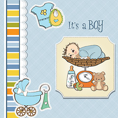 Image showing baby boy weighed on the scale