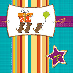 Image showing three dogs that offer a big gift. birthday greeting card