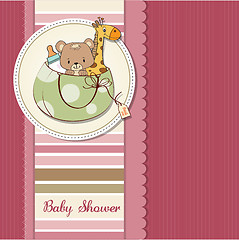 Image showing new baby announcement card with bag and same toys