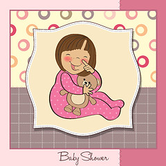 Image showing little baby girl with her teddy bear toy